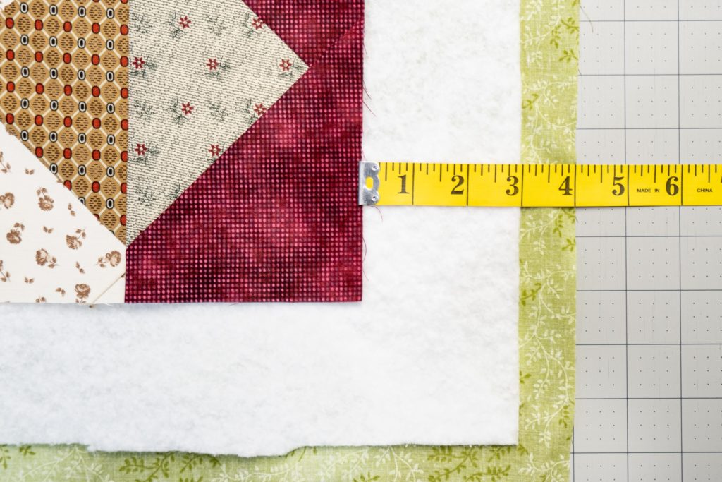 Quilt showing Batting and Backing 4" Past Quilt Edge